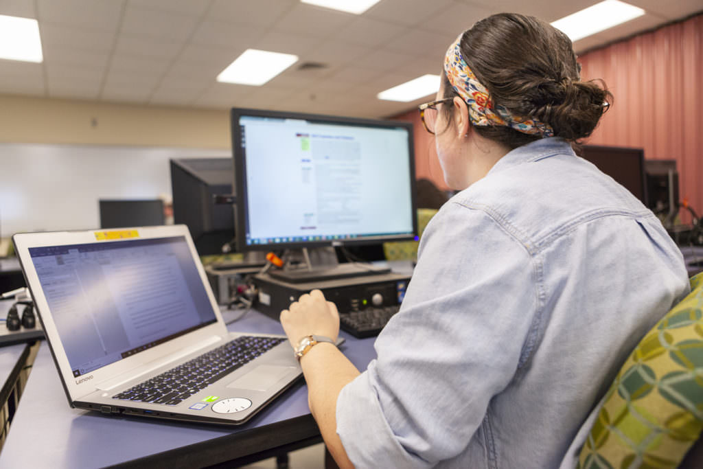 woman using computer