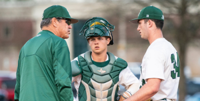 Coach Sprowl and two players