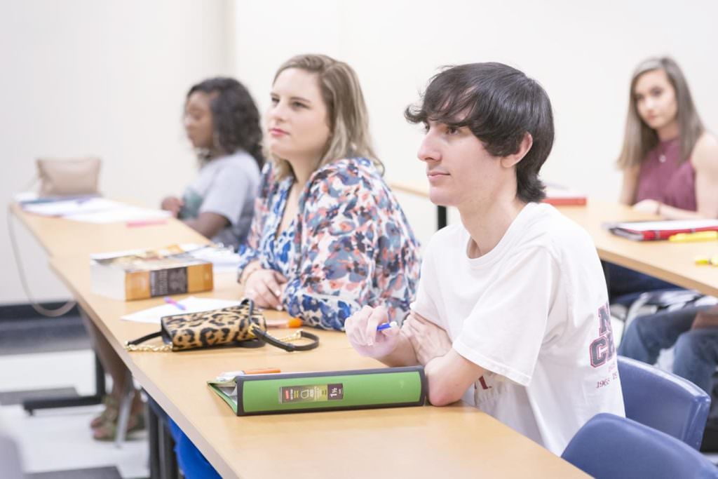 Students in classroom looking attentive