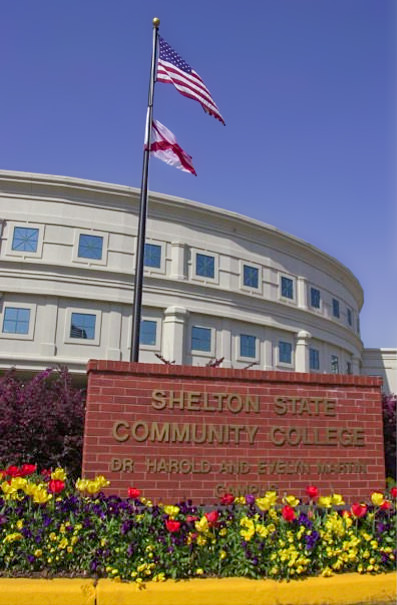 Shelton State Community College Sign with flowers